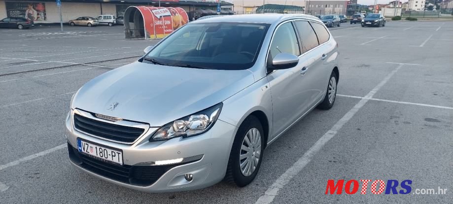 2015' Peugeot 308 Sw photo #1