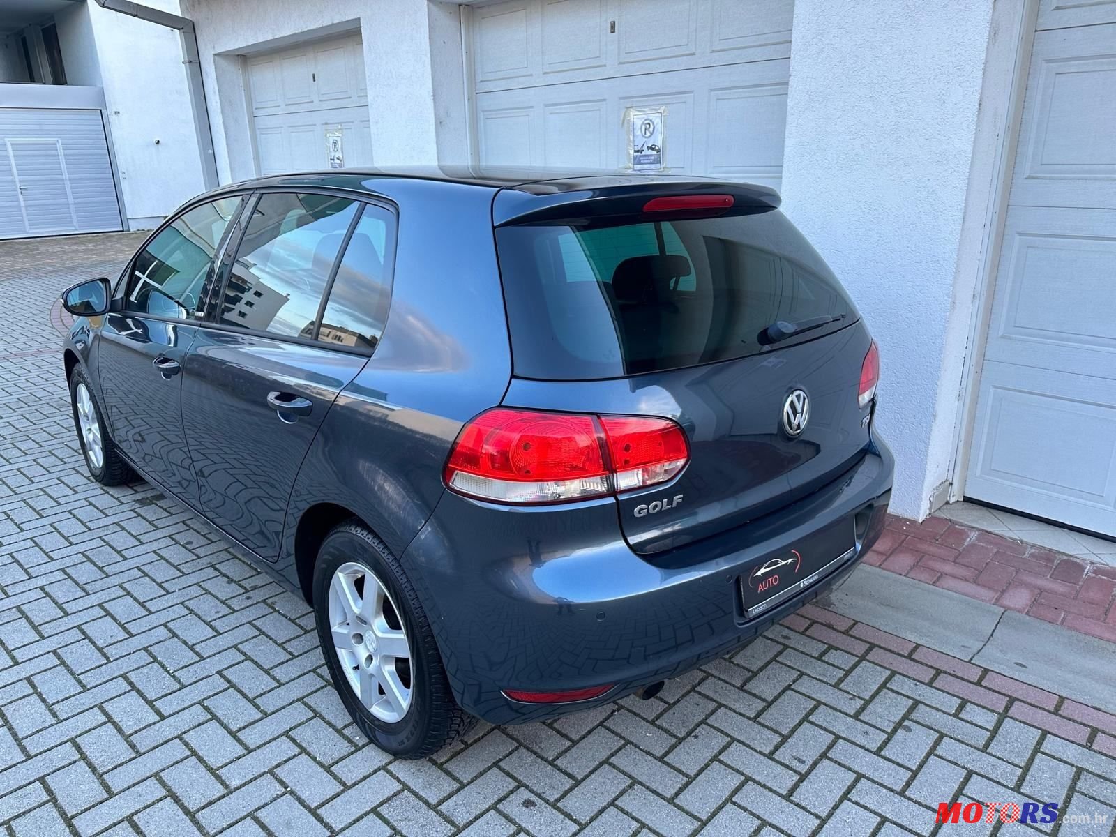 2012' Volkswagen Golf VI 1,6 Tdi photo #3