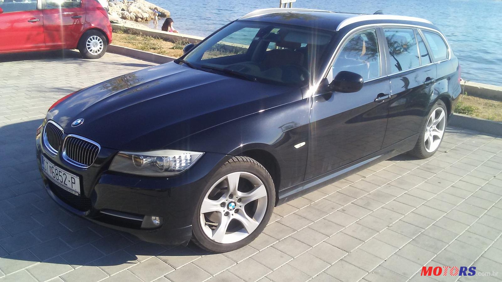 2012' BMW 3 Series Touring photo #4