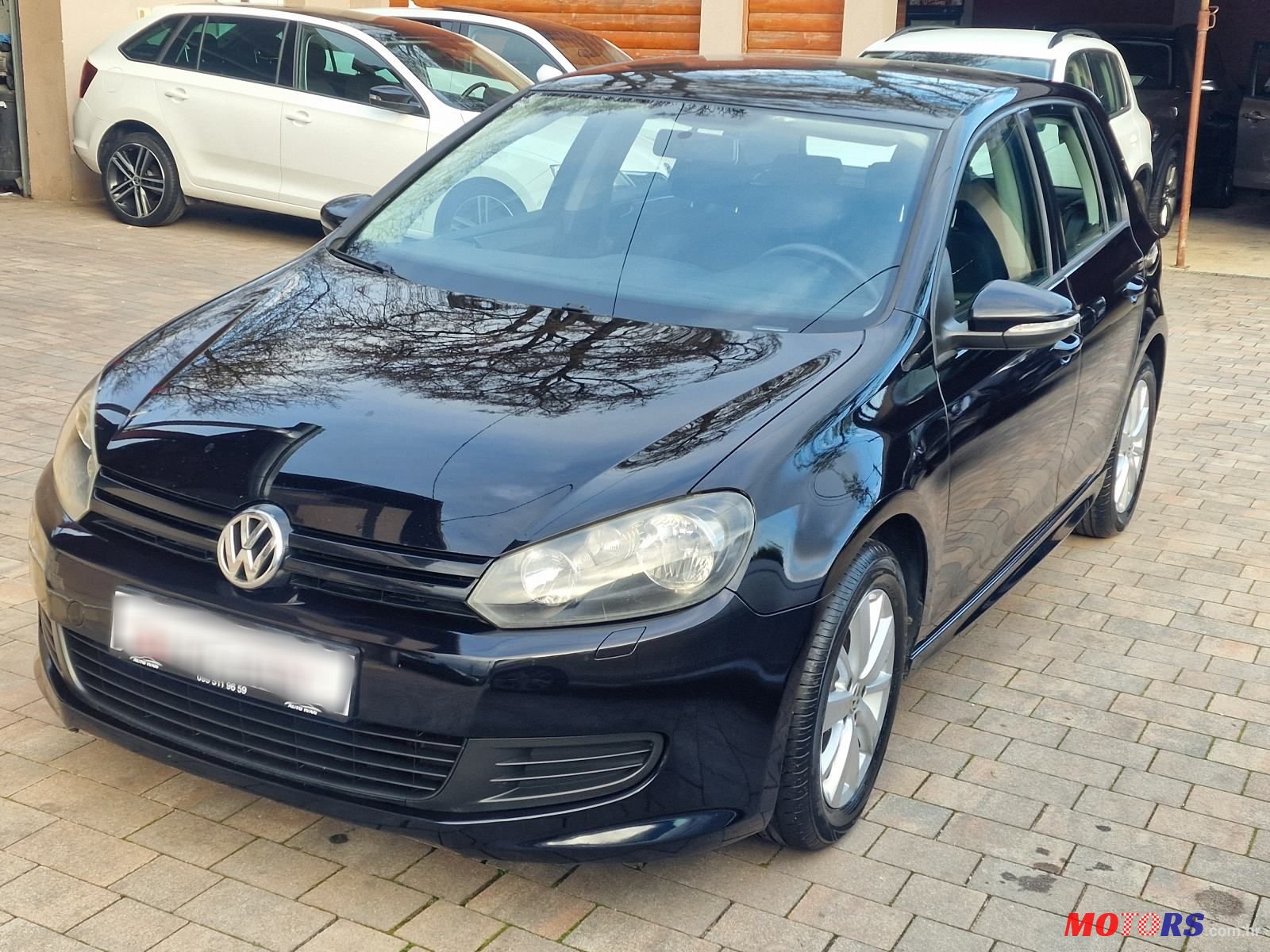 2011' Volkswagen Golf VI 1,6 Tdi photo #3
