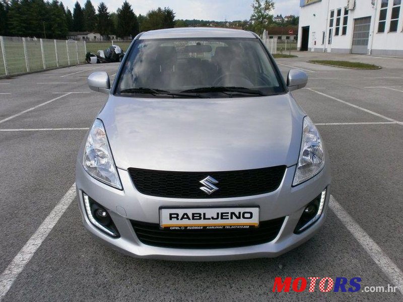 2015' Suzuki Swift 1,3 Ac photo #1