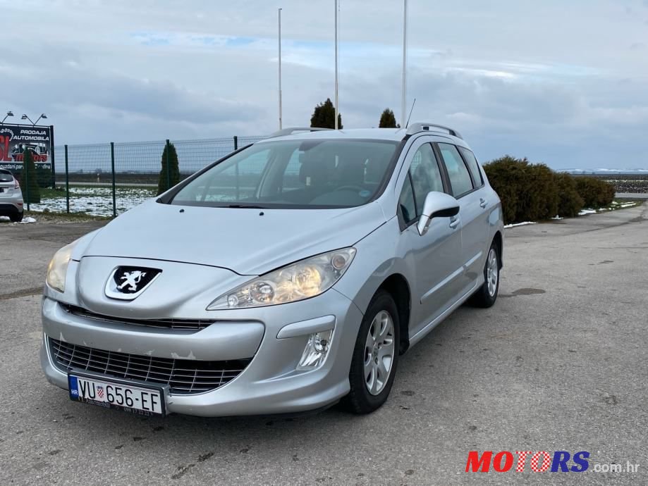 2011' Peugeot 308 Sw photo #1