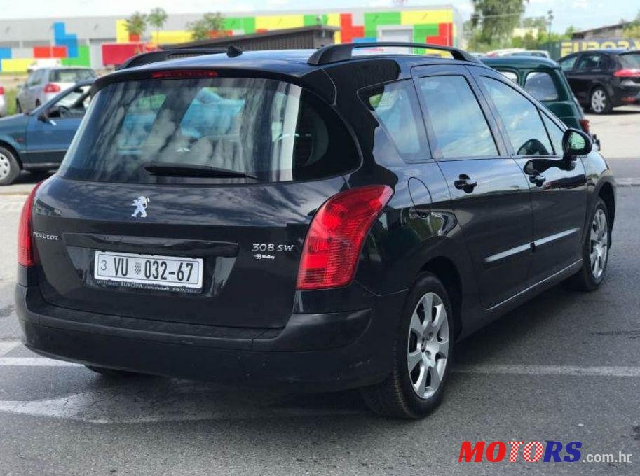 2011' Peugeot 308 Sw 1,6 E-Hdi photo #2