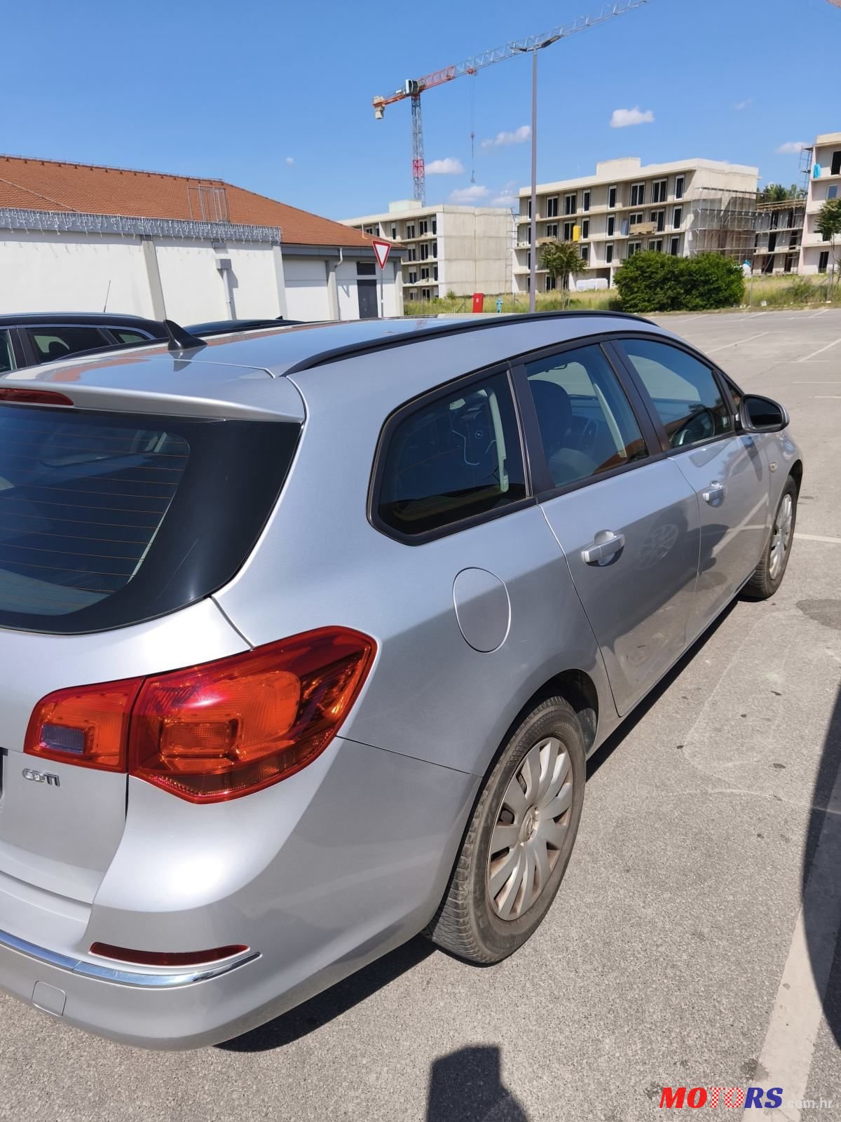 2015' Opel Astra Karavan photo #6