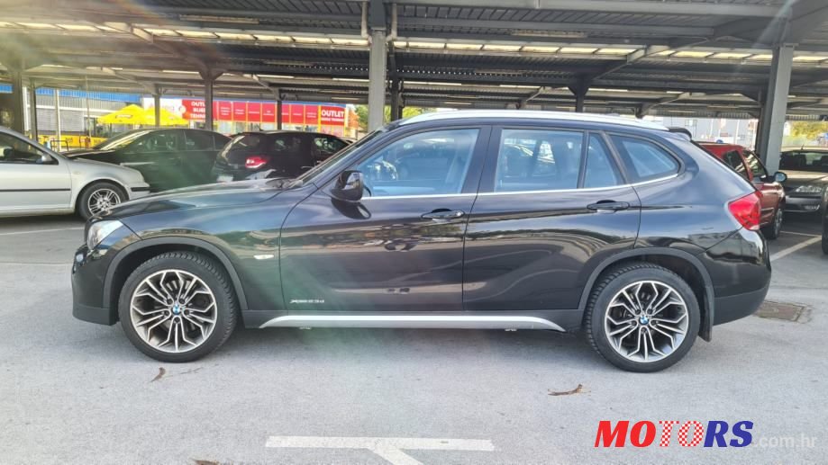 2011' BMW X1 Xdrive23D photo #6