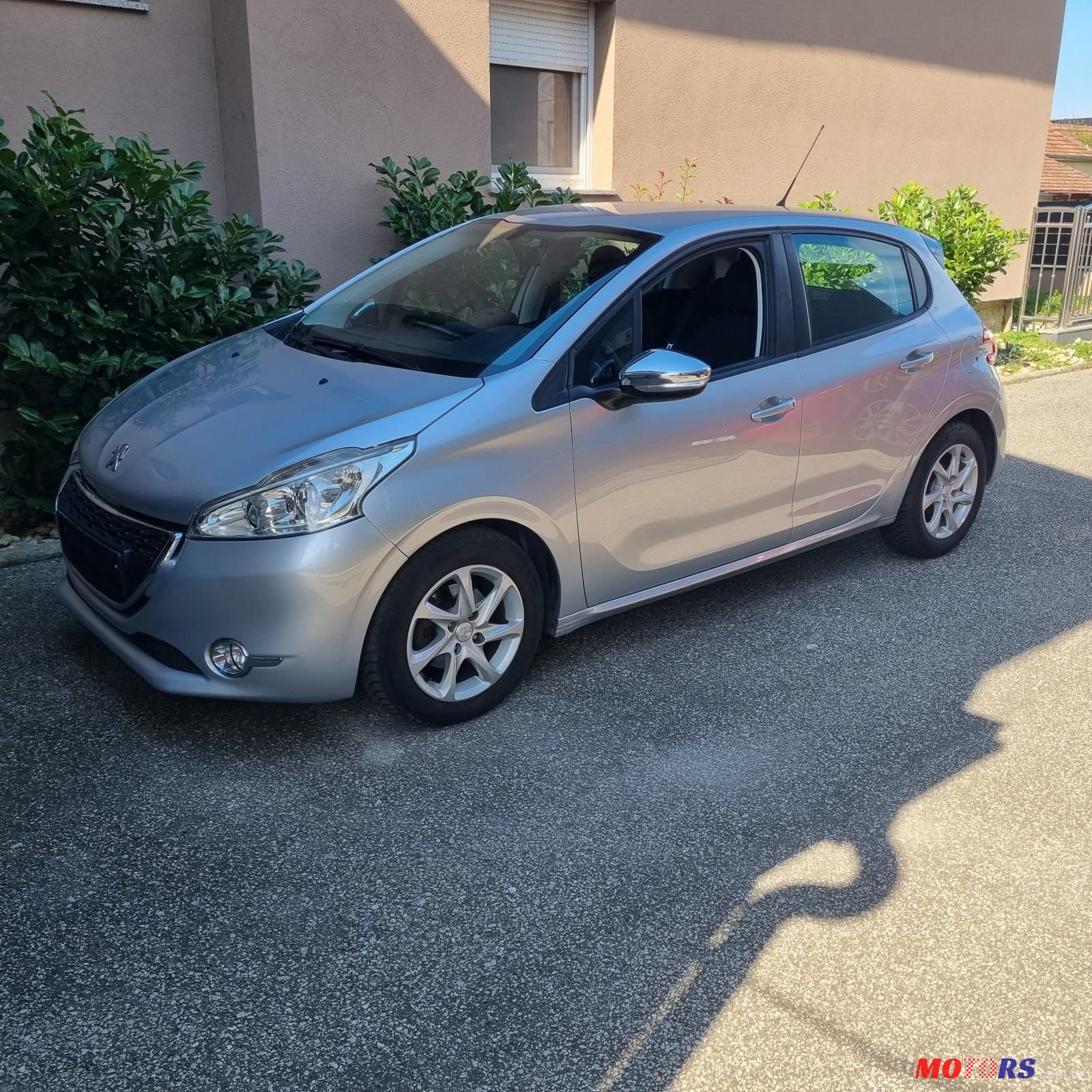 2014' Peugeot 208 1,2 Vti photo #1