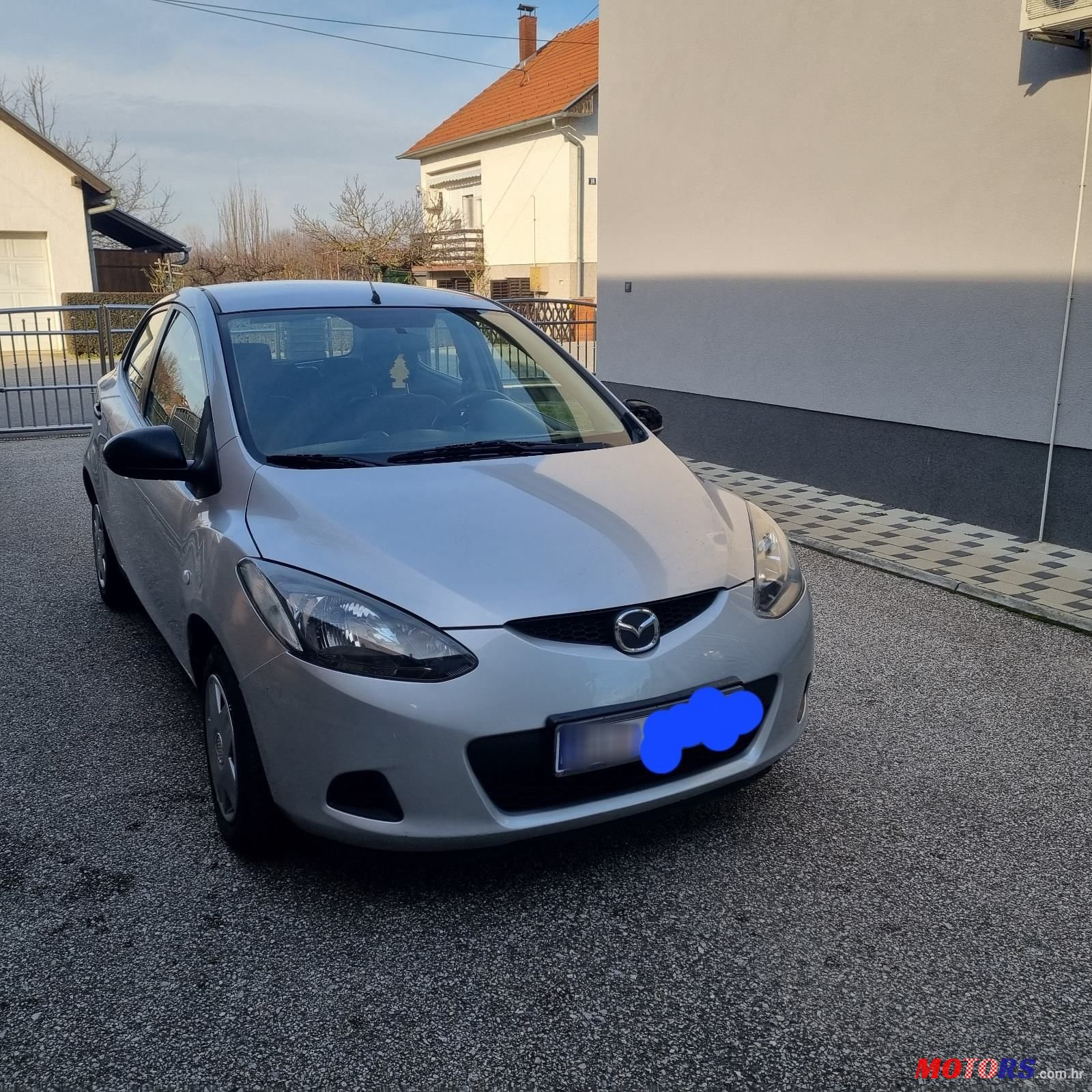 2009' Mazda 2 1,3 I Ce photo #1