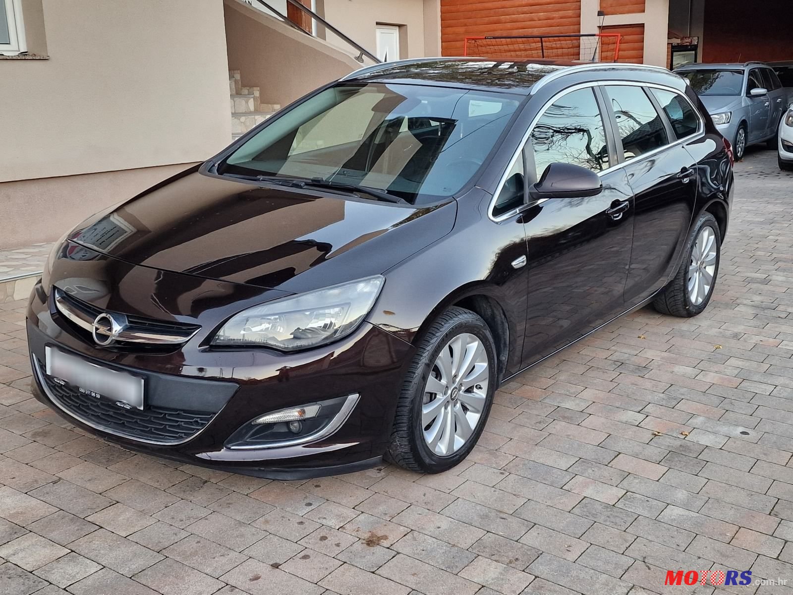 2014' Opel Astra Karavan photo #1