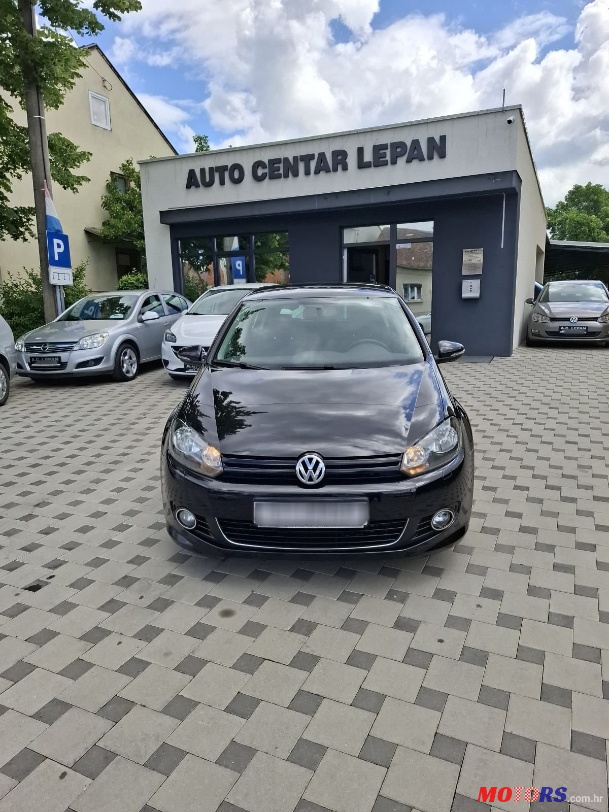 2011' Volkswagen Golf VI 1,6 Tdi photo #1