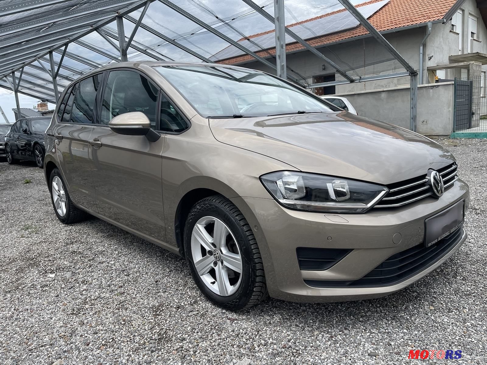 2014' Volkswagen Golf Sportsvan photo #3