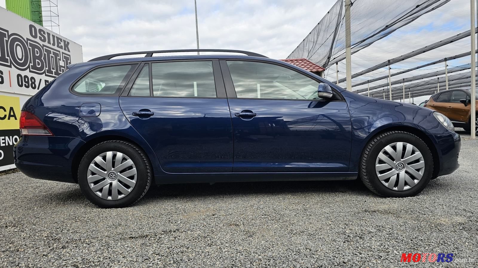 2012' Volkswagen Golf VI Variant photo #6