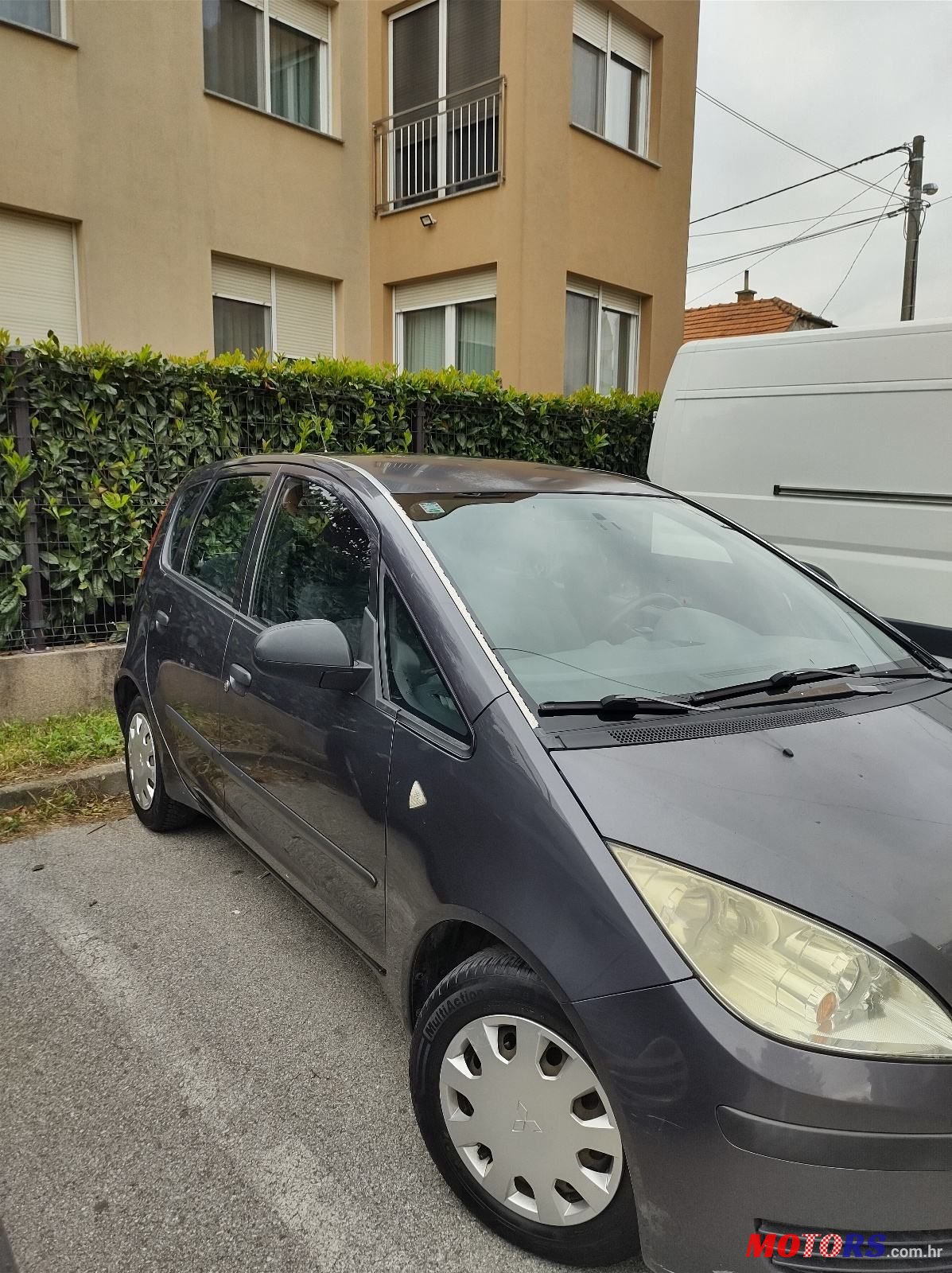 2004' Mitsubishi Colt 1,1 photo #2