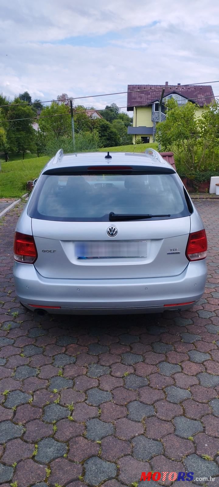 2012' Volkswagen Golf VI Variant photo #3