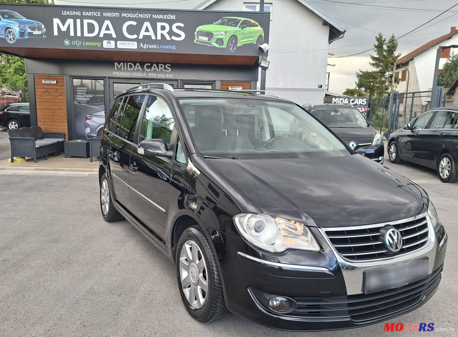 2009' Volkswagen Touran 1,4 Tsi photo #1