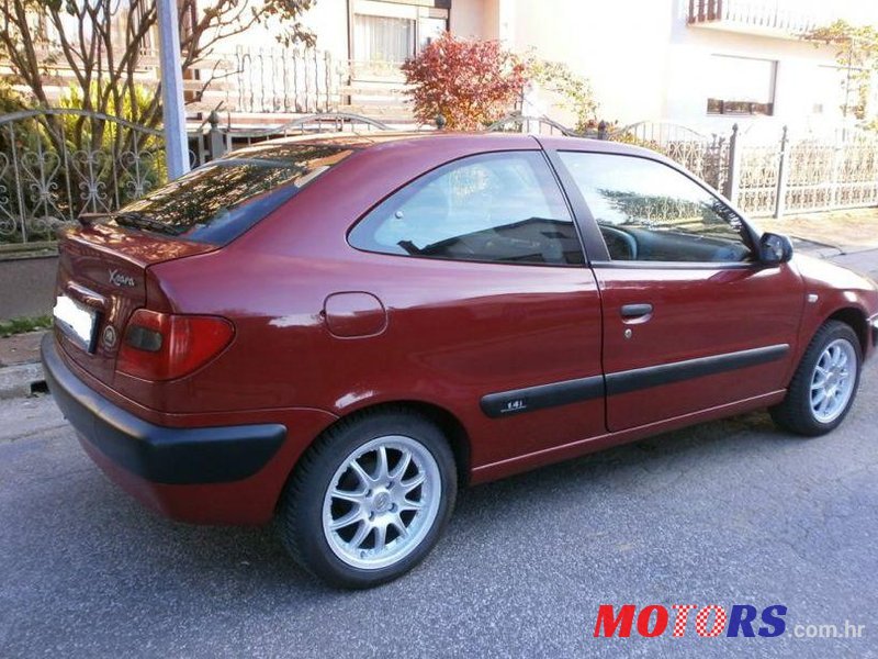 2000' Mazda 323 1.4I photo #1