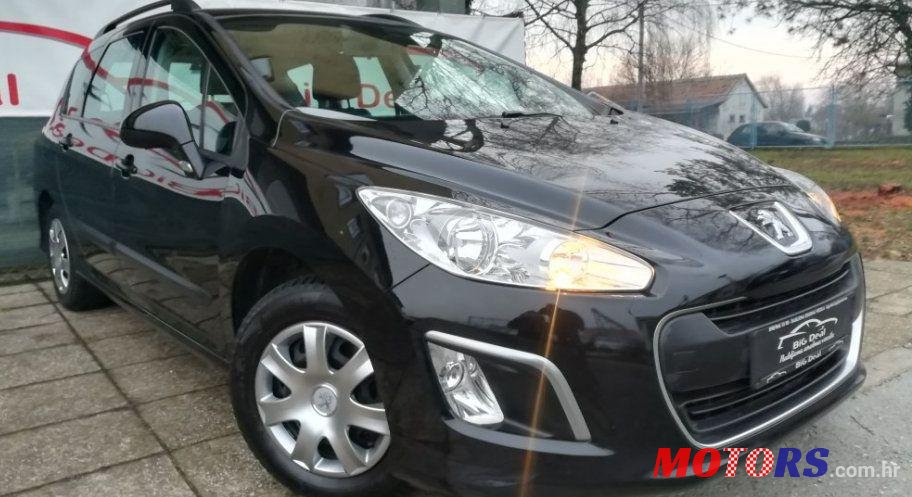 2011' Peugeot 308 Sw 1,6 E-Hdi photo #1