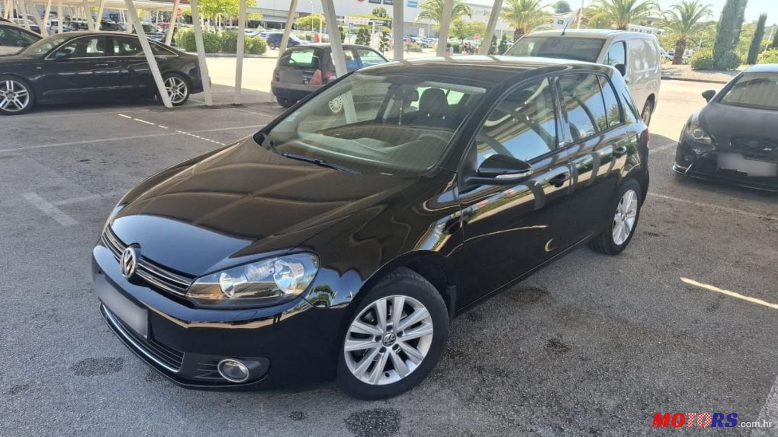 2011' Volkswagen Golf VI 1,6 Tdi photo #1