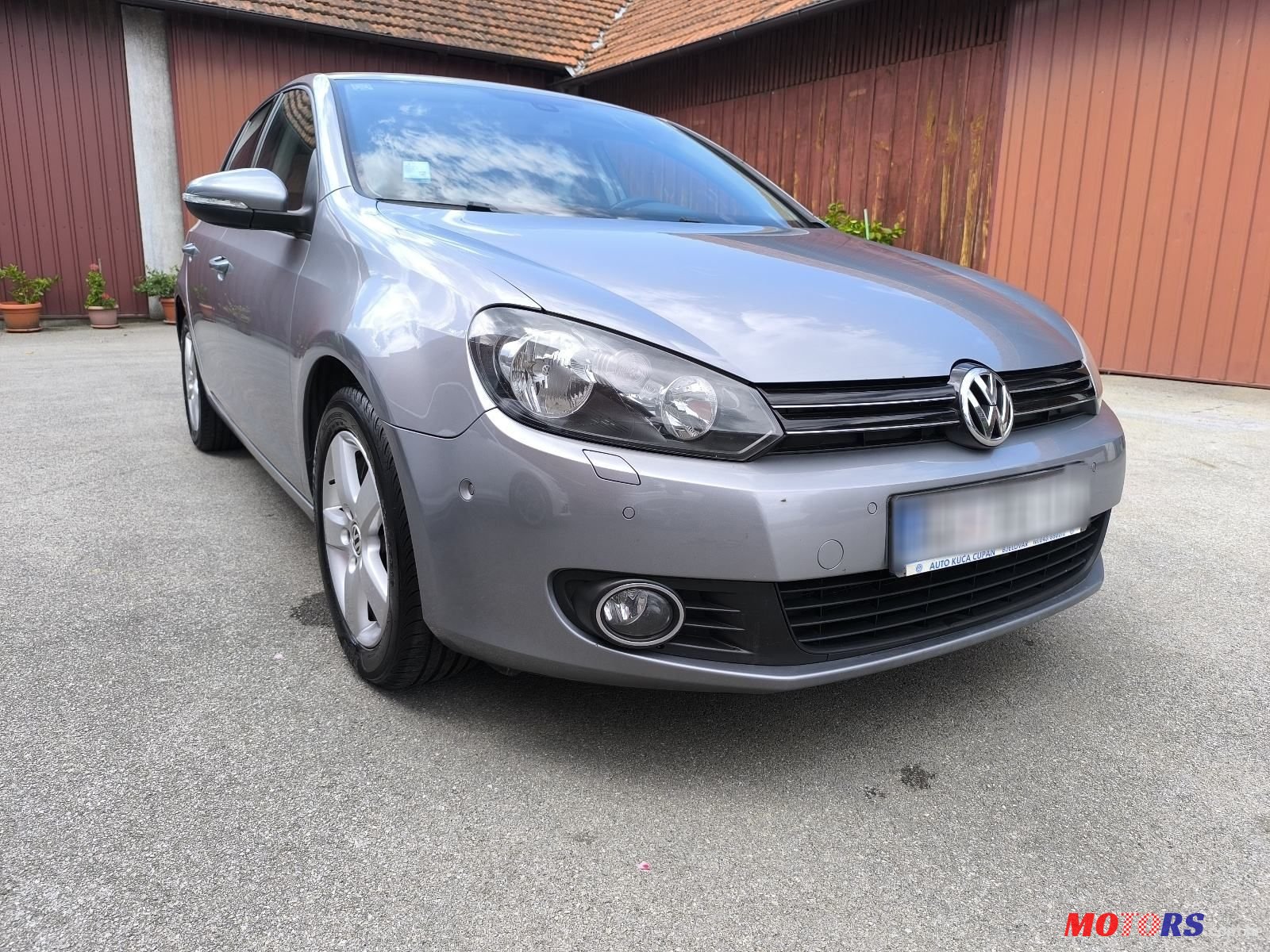 2010' Volkswagen Golf VI 1,6 Tdi photo #2