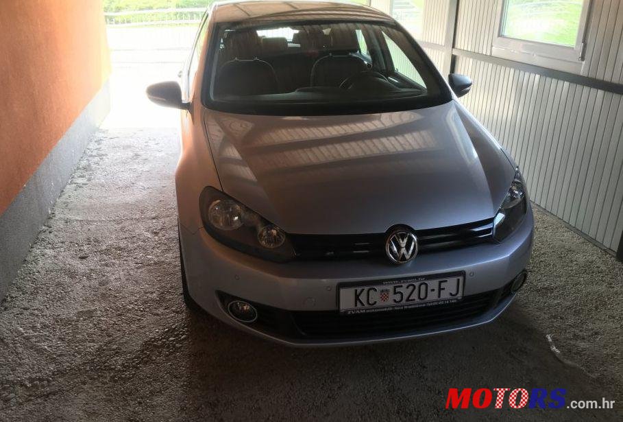 2011' Volkswagen Golf VI 1,6 Tdi photo #1