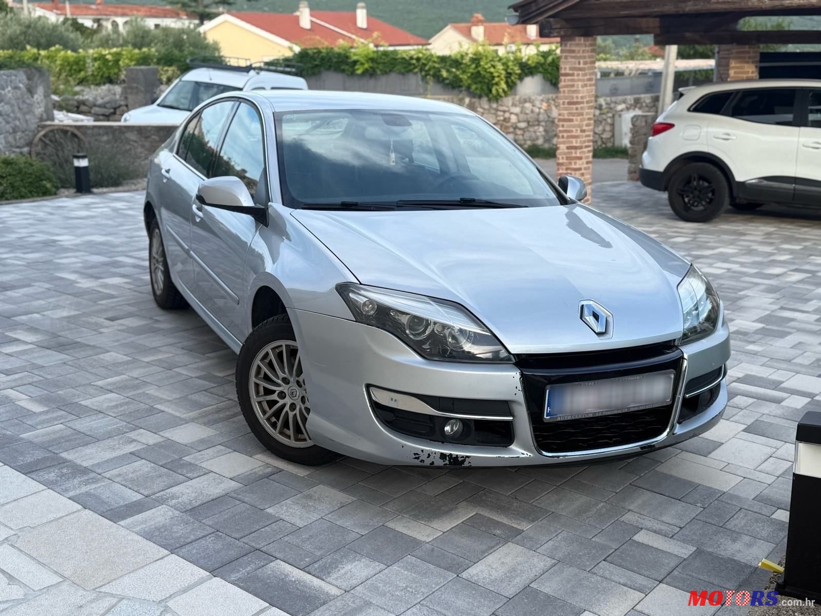 2011' Renault Laguna 1,5 Dci photo #1