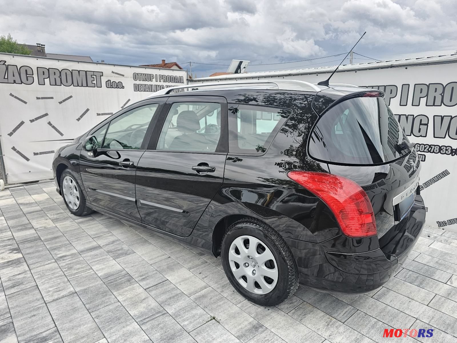 2009' Peugeot 308 Sw photo #1