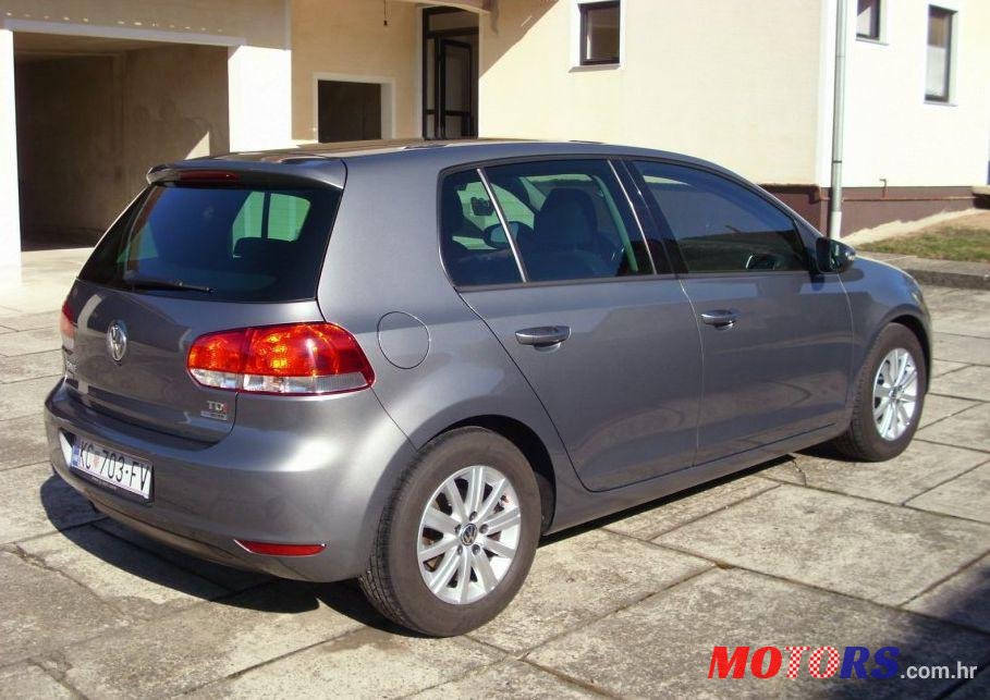 2012' Volkswagen Golf VI 1,6 Tdi photo #2