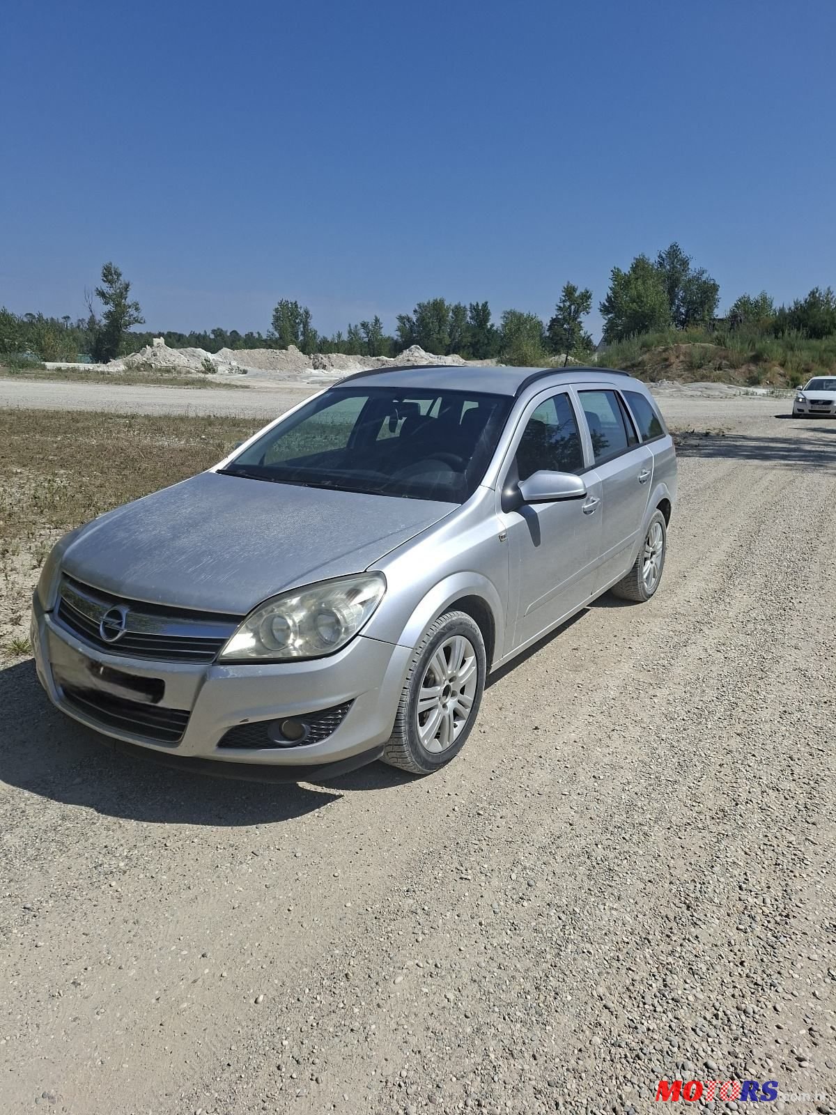 2009' Opel Astra Karavan photo #2