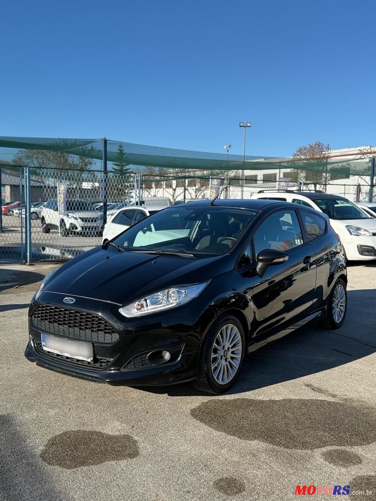 2014' Ford Fiesta 1,6 photo #1