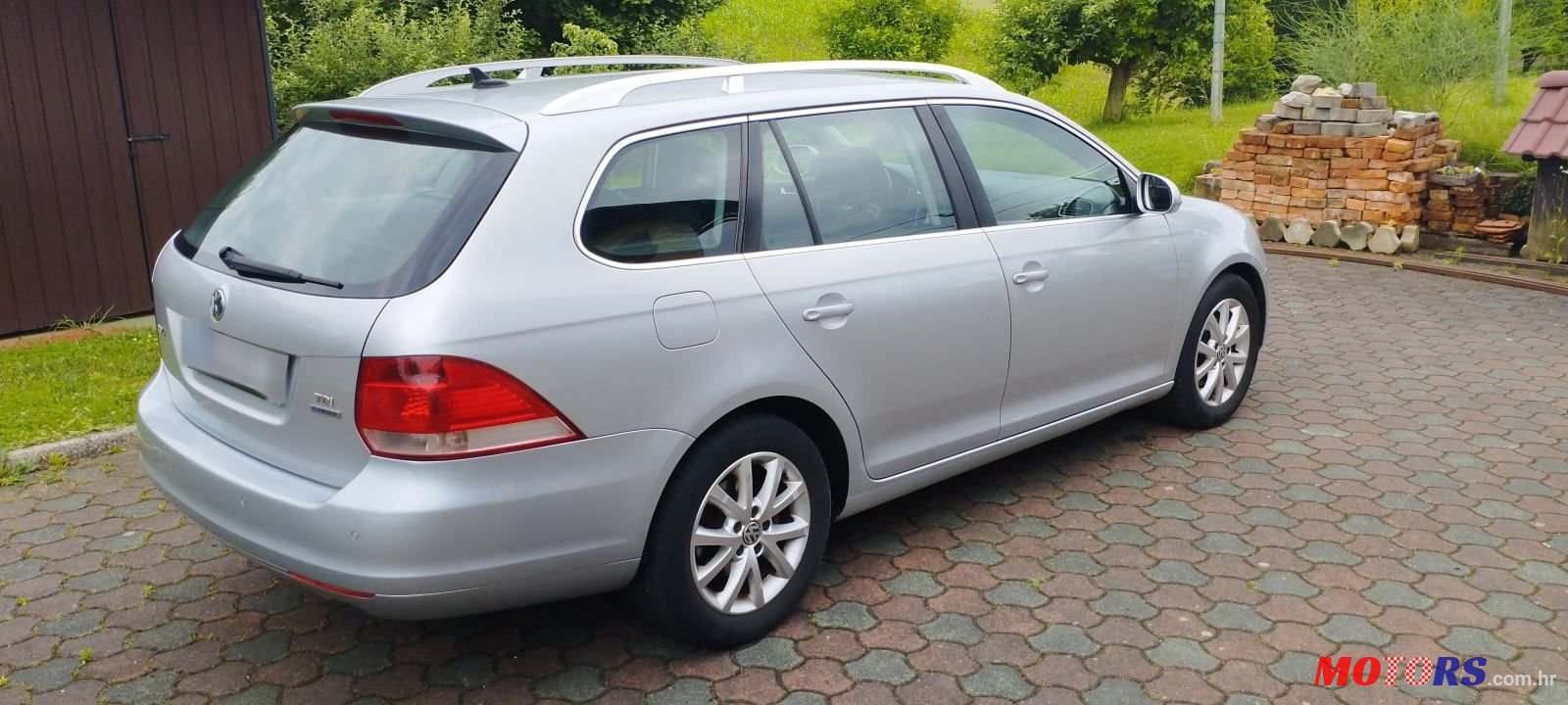 2012' Volkswagen Golf VI Variant photo #5