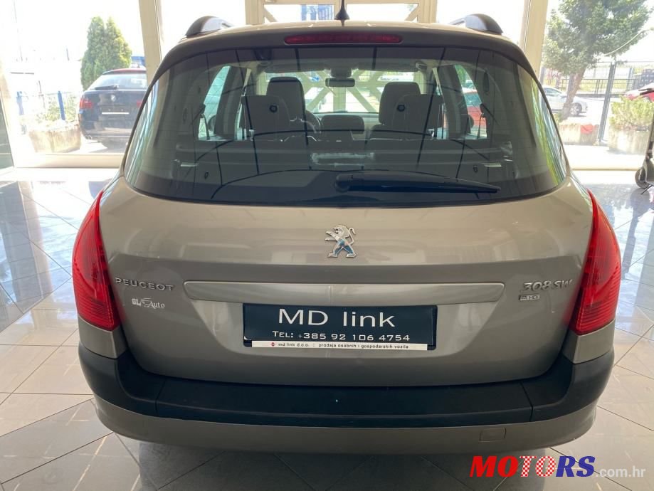 2012' Peugeot 308 Sw photo #5