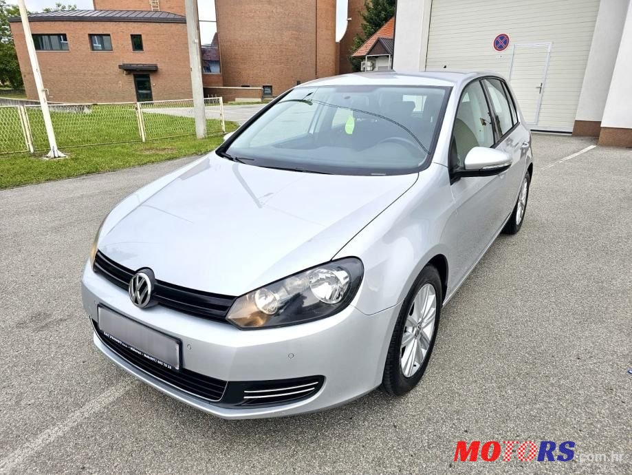 2011' Volkswagen Golf VI 1,6 Tdi photo #1