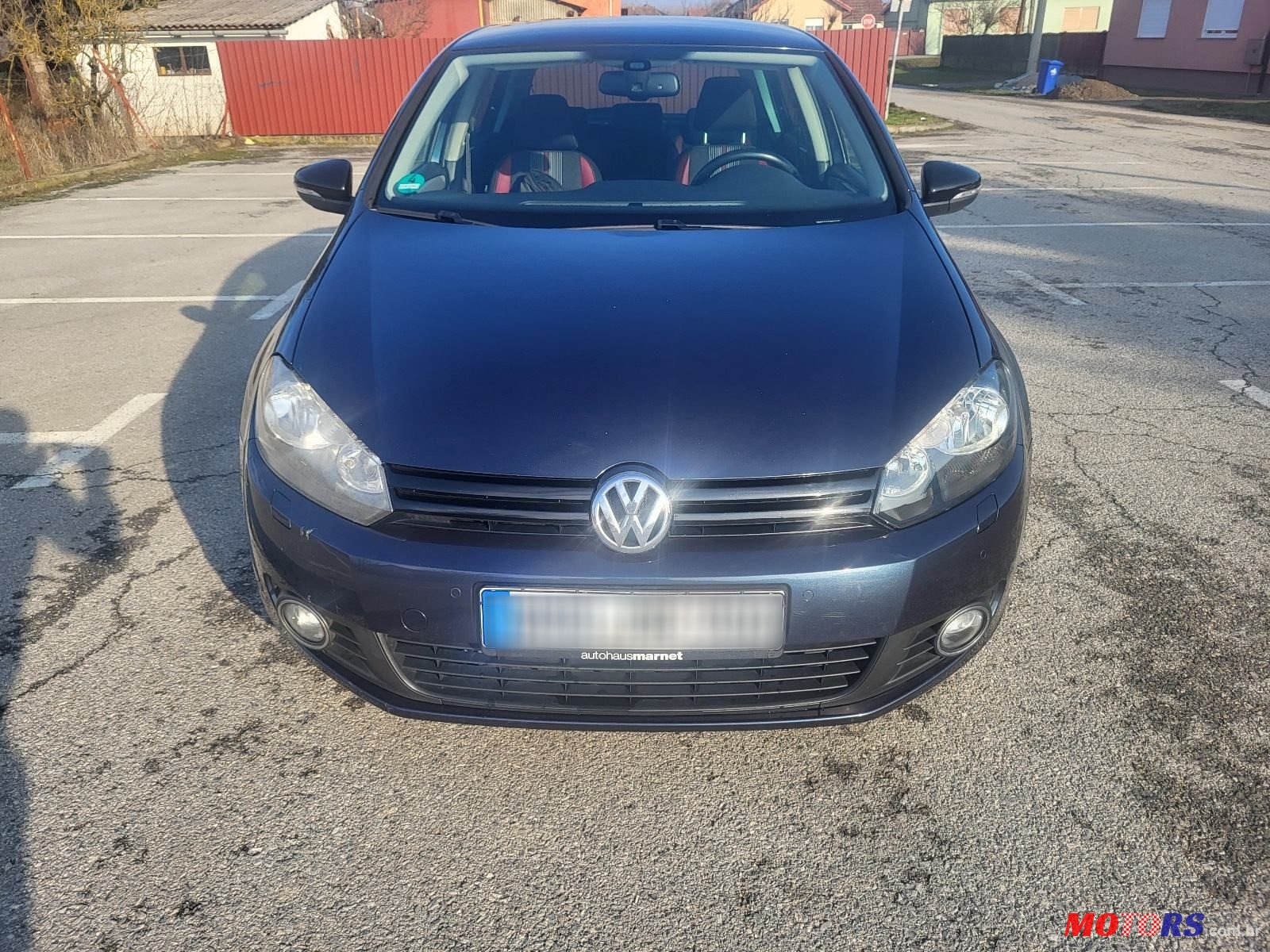 2012' Volkswagen Golf VI 1,6 Tdi photo #1