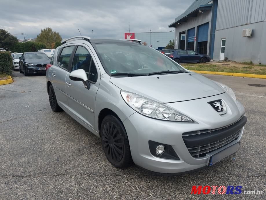 2011' Peugeot 207 Sw photo #1