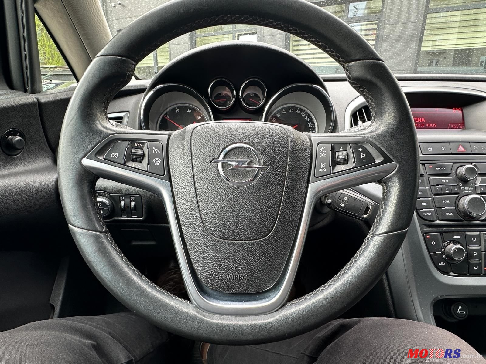 2014' Opel Astra Karavan photo #6