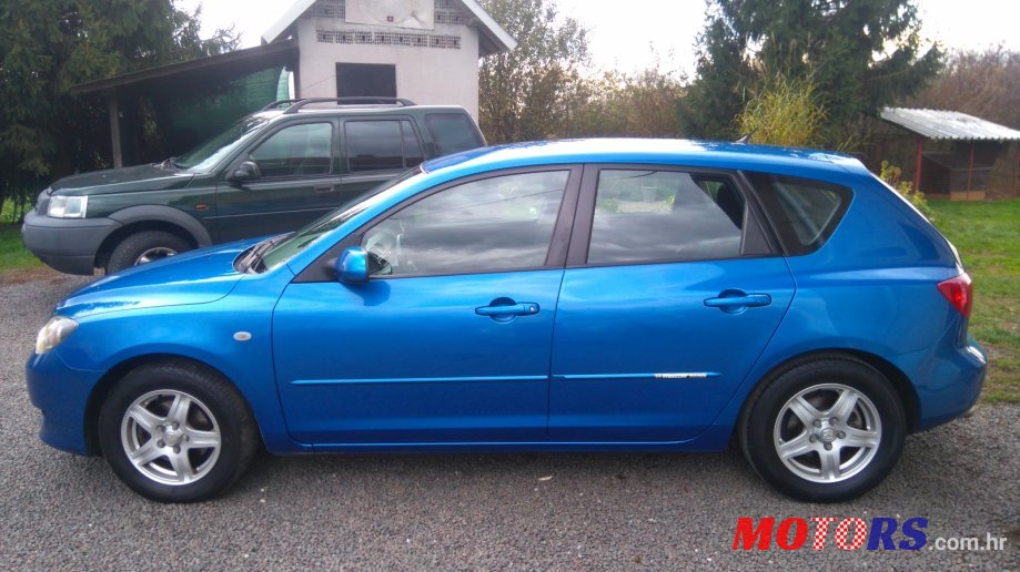 2004' Mazda 3 photo #1