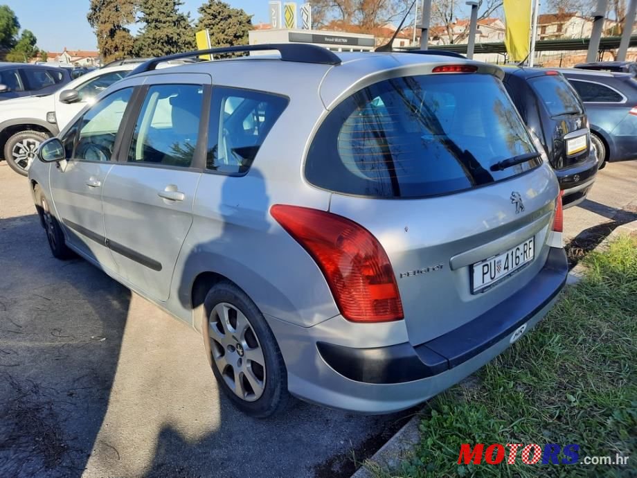 2011' Peugeot 308 Sw photo #3