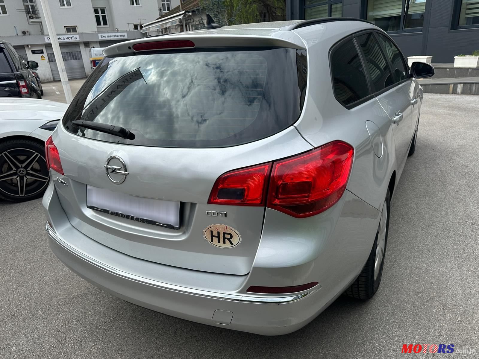 2014' Opel Astra Karavan photo #4