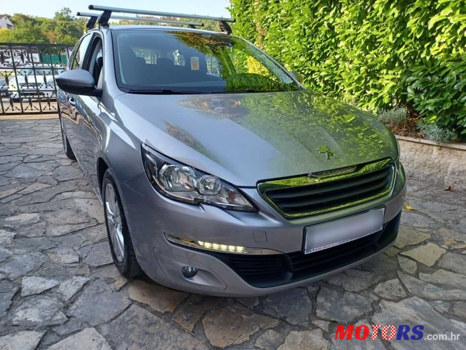 2016' Peugeot 308 Sw photo #1