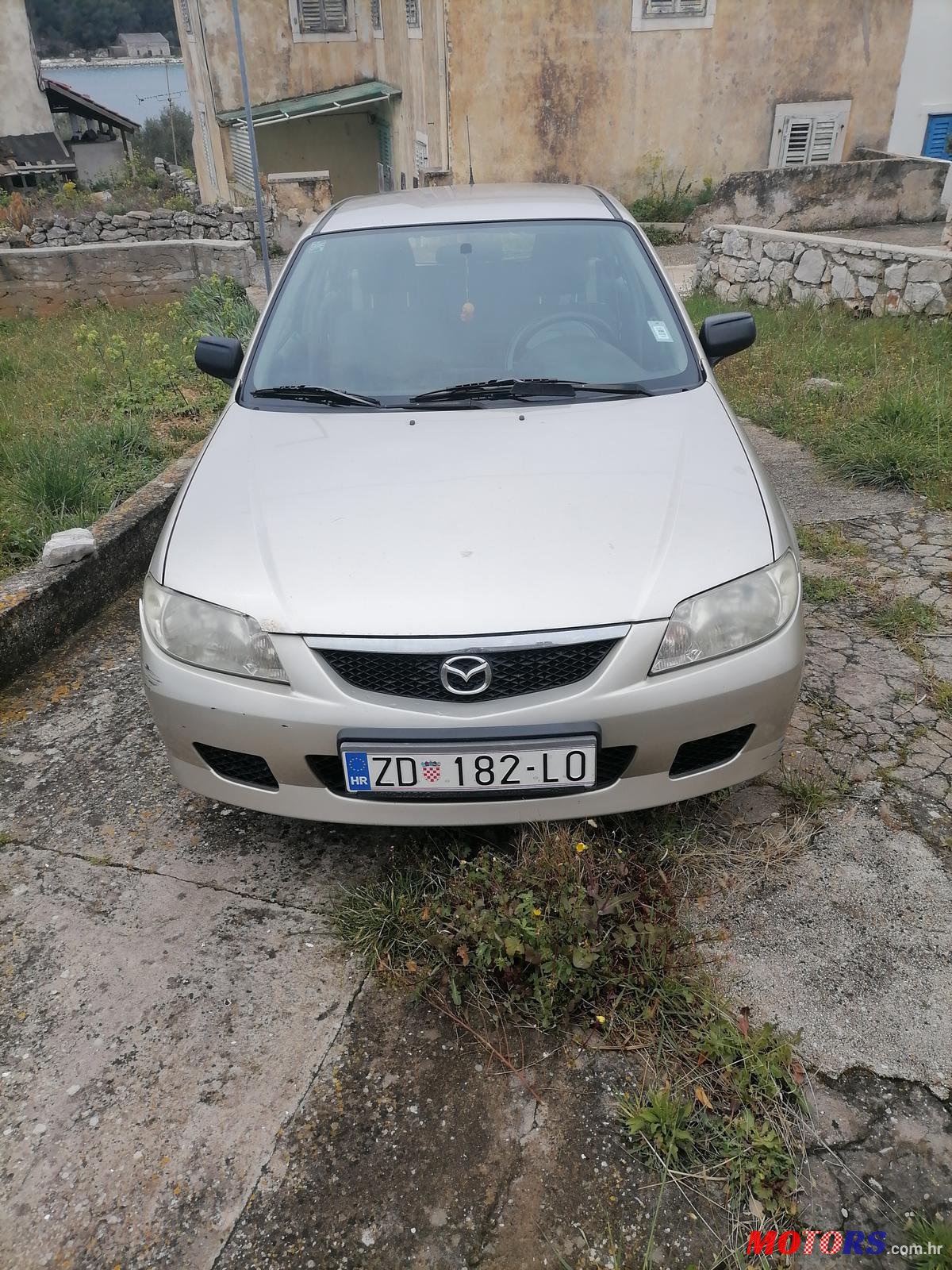 2002' Mazda 323 F 1,3I  EVISION photo #1