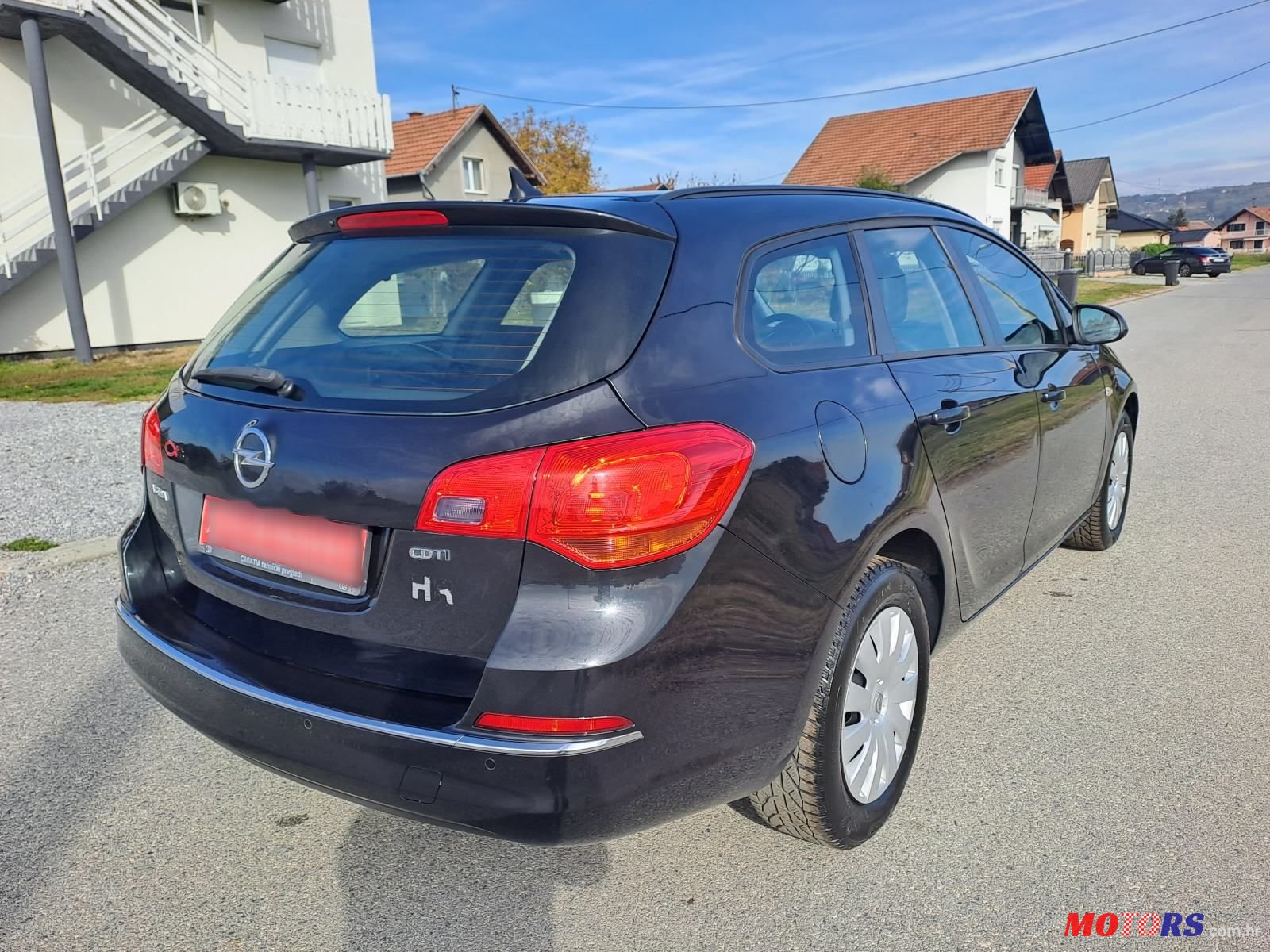 2015' Opel Astra Karavan photo #5