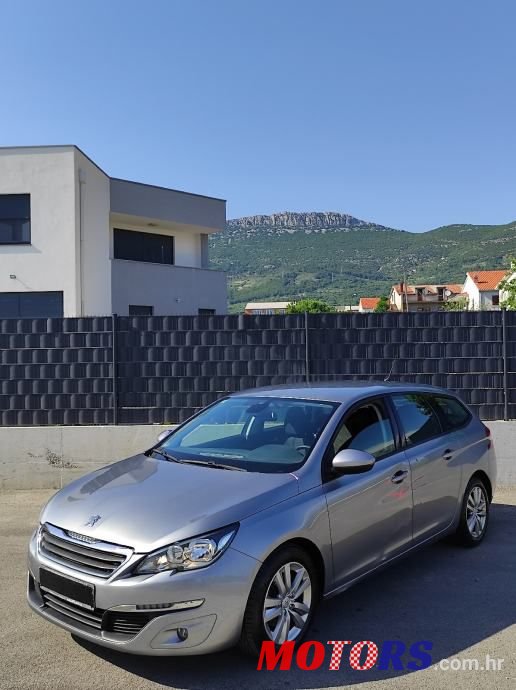 2015' Peugeot 308 Sw photo #1