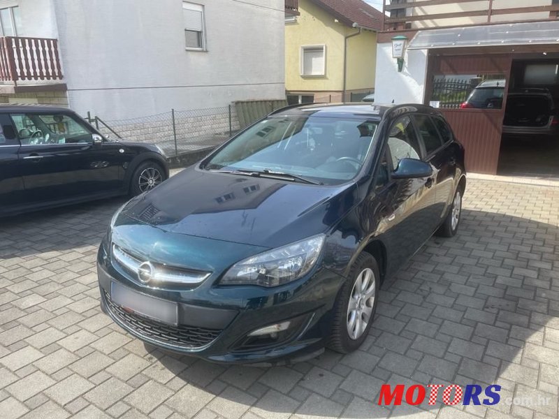 2015' Opel Astra Karavan photo #1