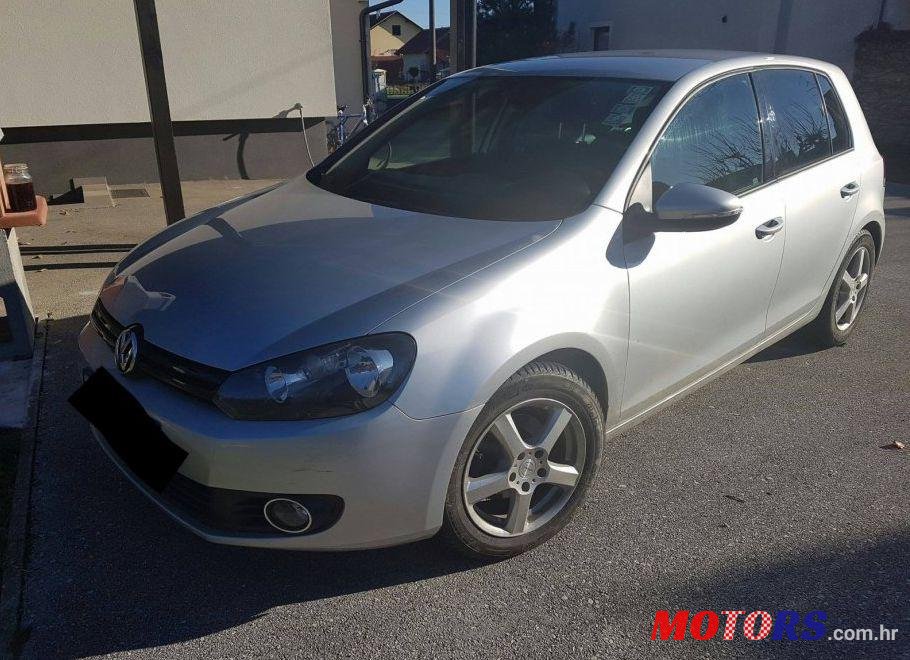 2011' Volkswagen Golf VI 1,6 TDI photo #1