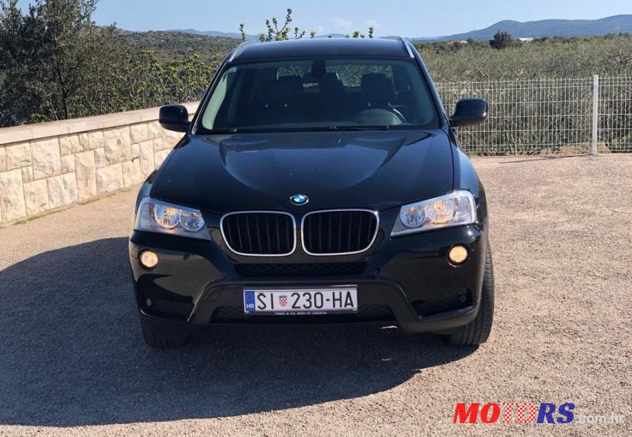 2011' BMW X3 Xdrive20D photo #1