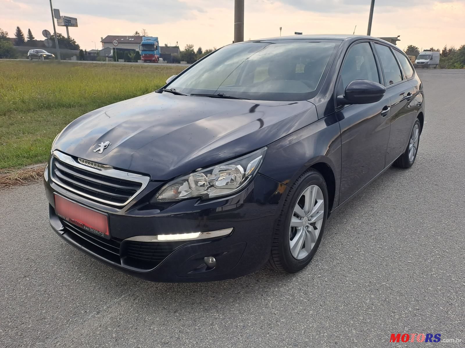2015' Peugeot 308 Sw photo #1