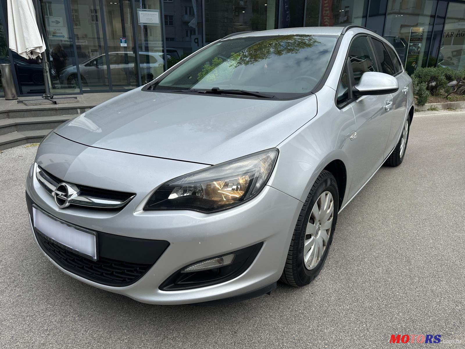 2014' Opel Astra Karavan photo #3