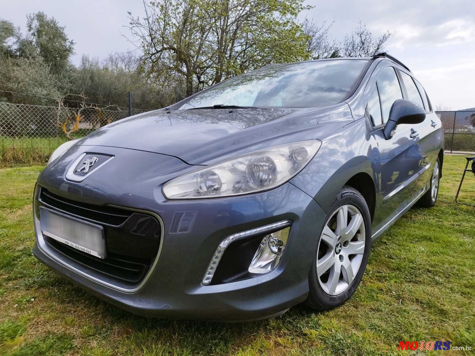 2012' Peugeot 308 Sw photo #2