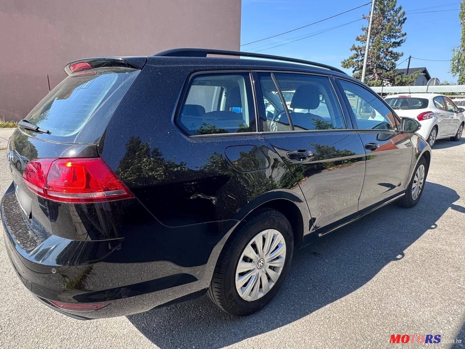 2014' Volkswagen Golf VII Variant photo #3