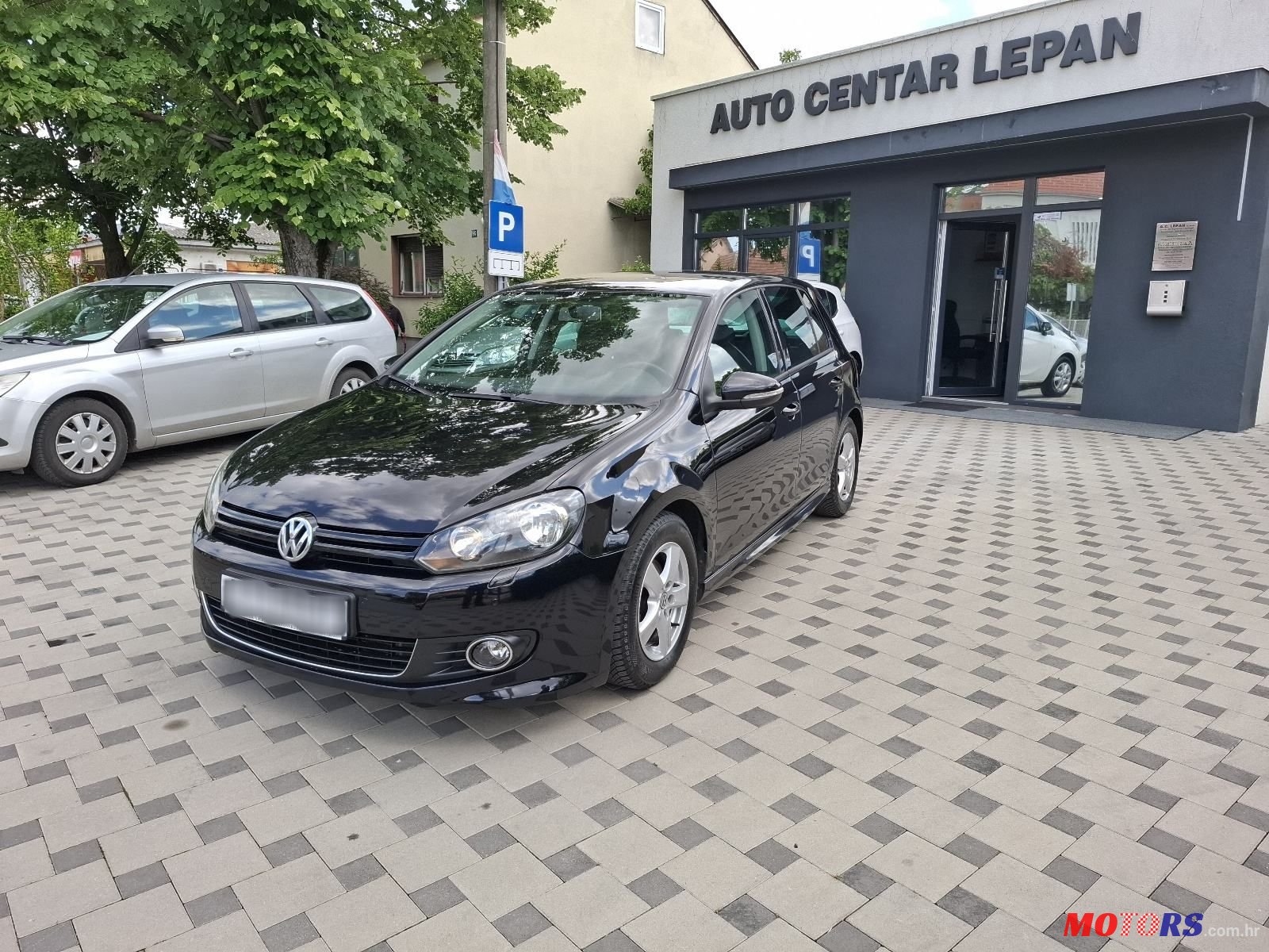 2011' Volkswagen Golf VI 1,6 Tdi photo #3