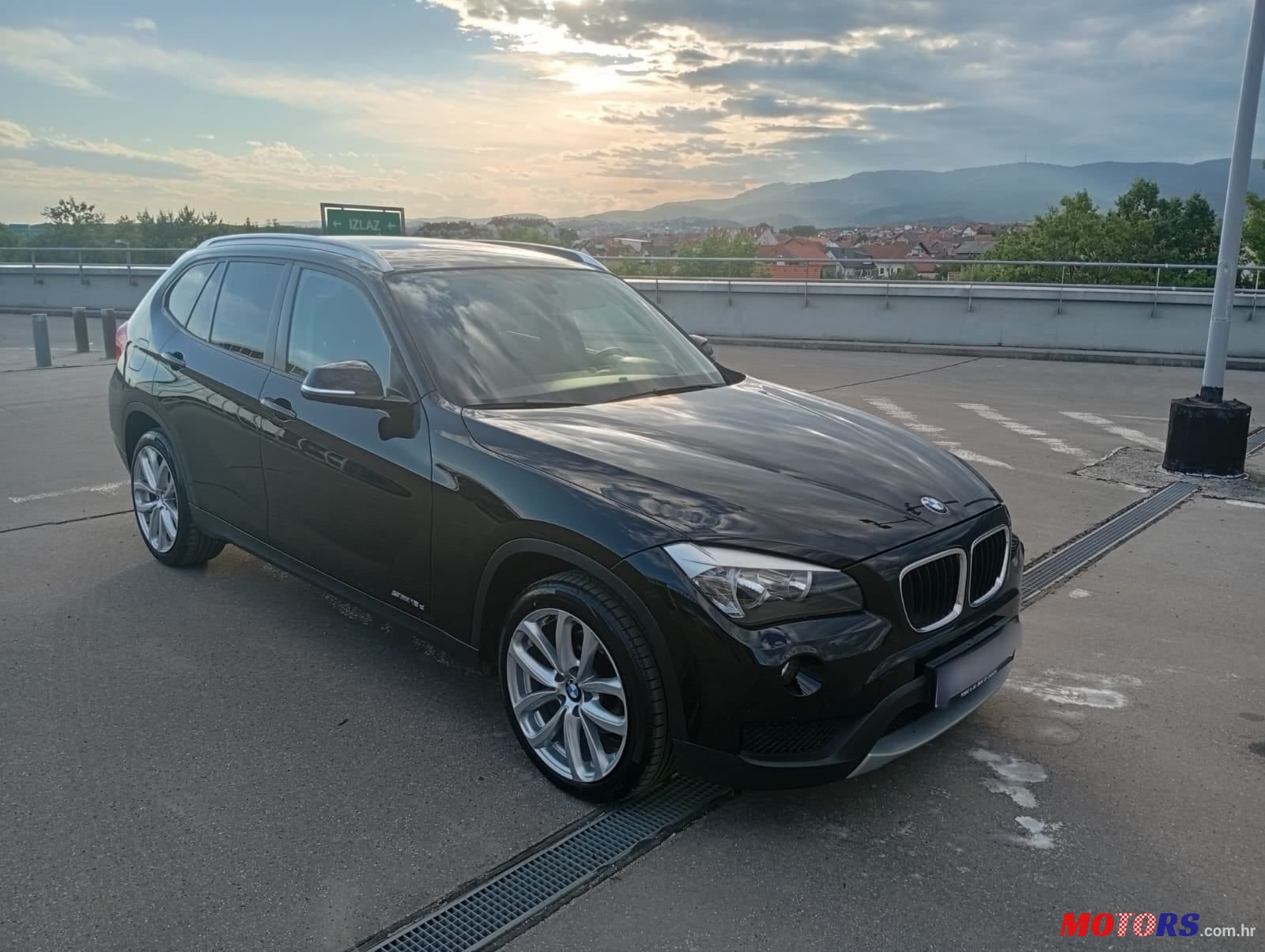 2013' BMW X1 Sdrive18D photo #2